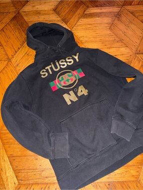 Stussy Black Hoodie with Gold Logo and Gucci Belt Print